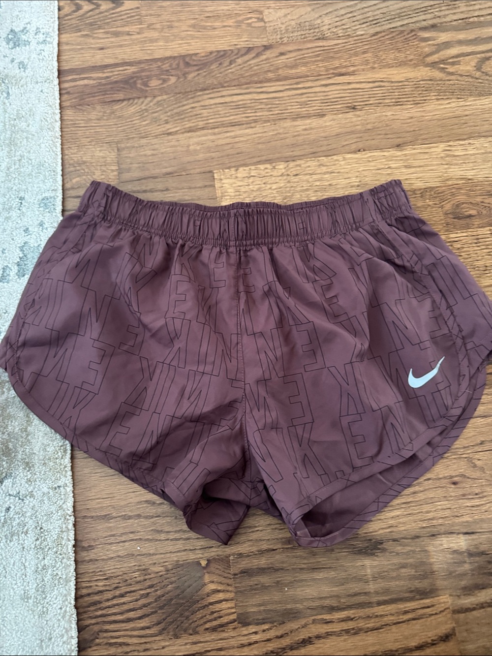 Nike Women's Maroon Athletic Shorts with White Swoosh
